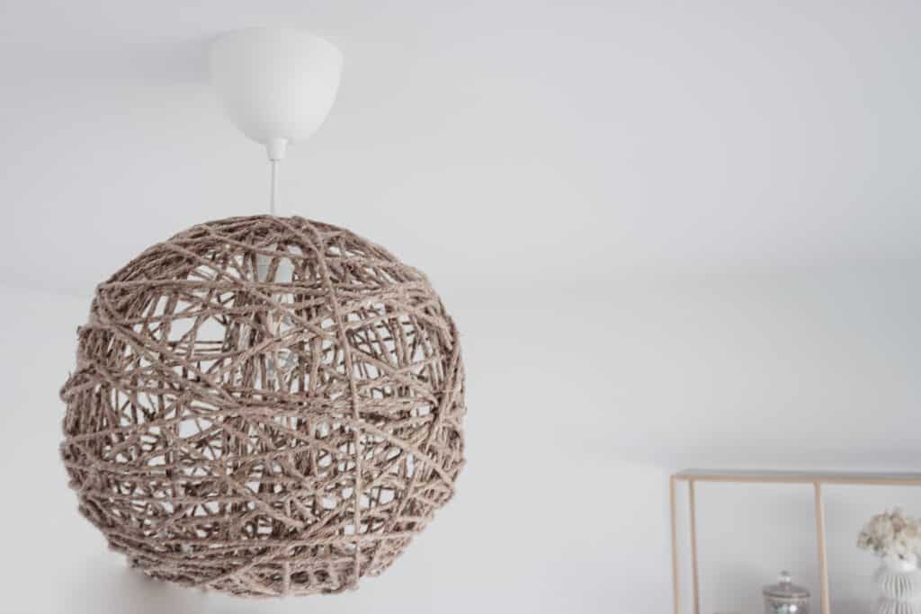 Signed Samantha's DIY pendant light is a rattan-ish style light - it is jute in a circular shape with an open centre.