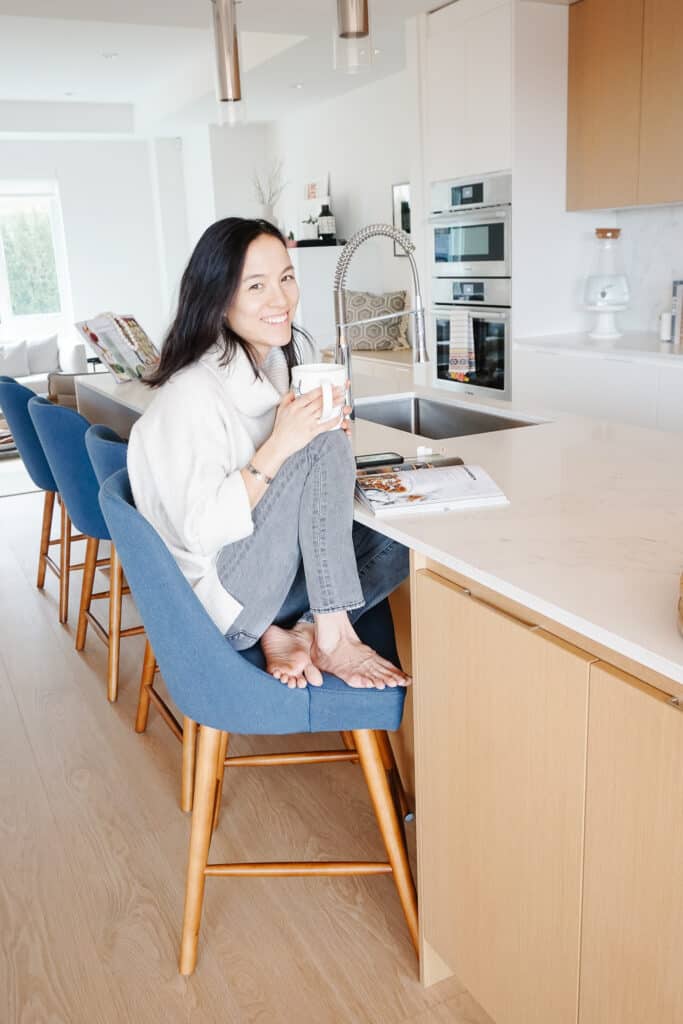 would you splurge vs. save on kitchen bar stools? Signed Samantha is sitting on her blue ones talking about how she would SAVE on puchasing them.