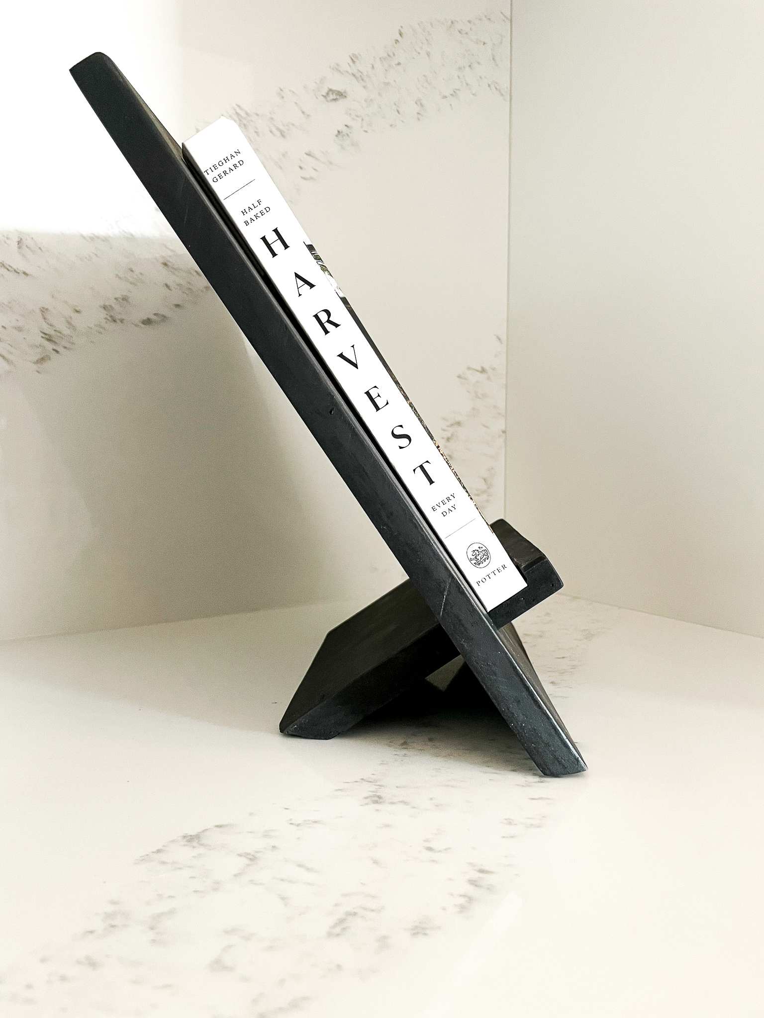 A DIY cookbook holder shown from the side