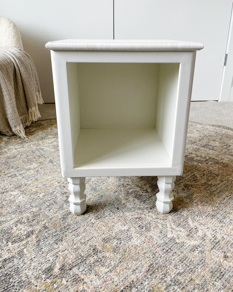 Ikea eket hack - making end tables! a completed version wtih detailed legs and trim around the front.