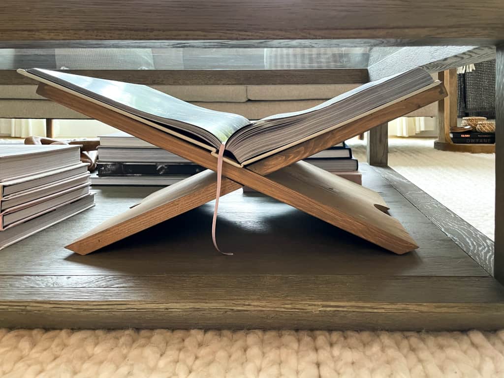 a book display sitting under a coffee table