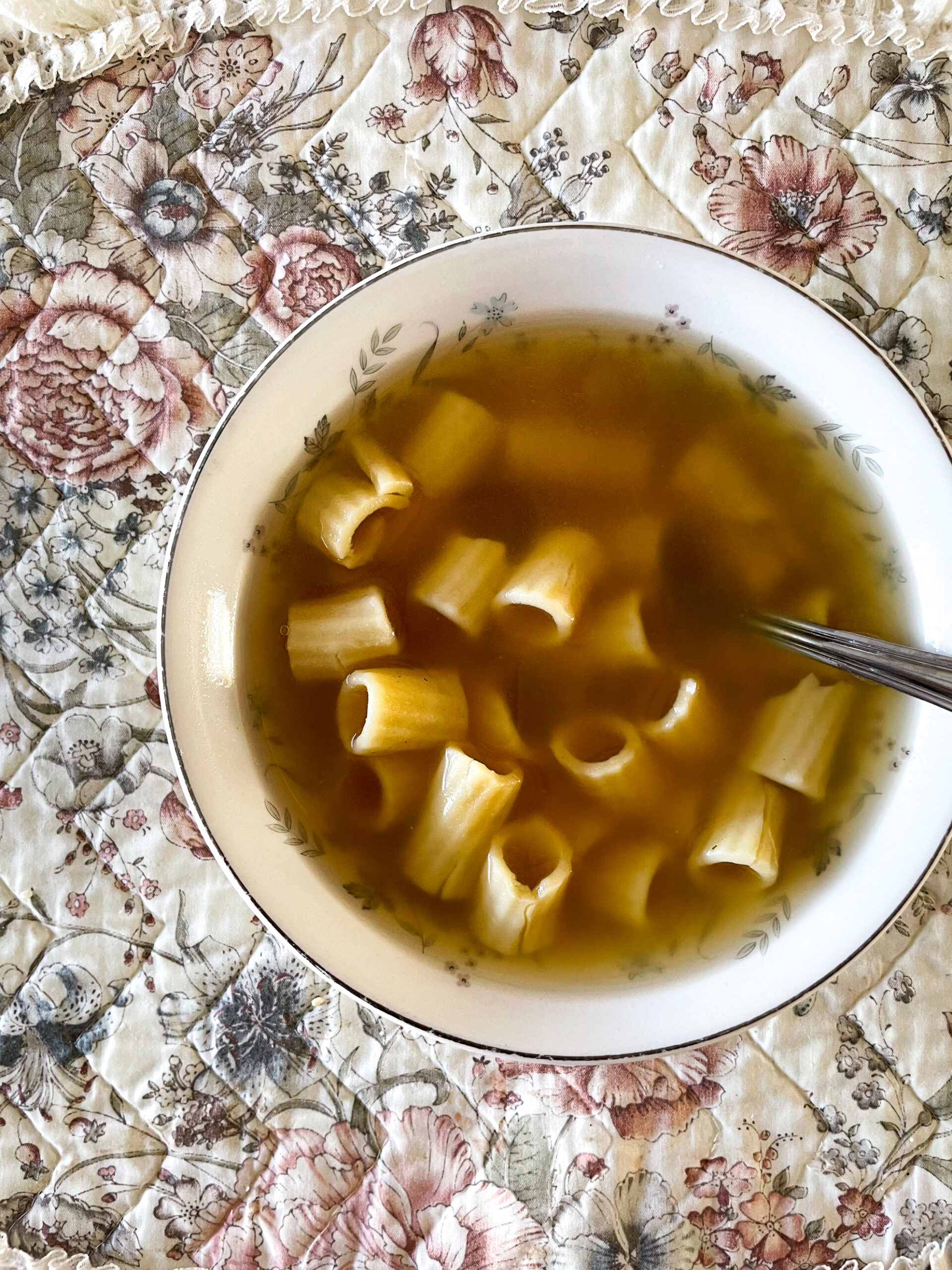 homemade soup in a bowl with noodles.