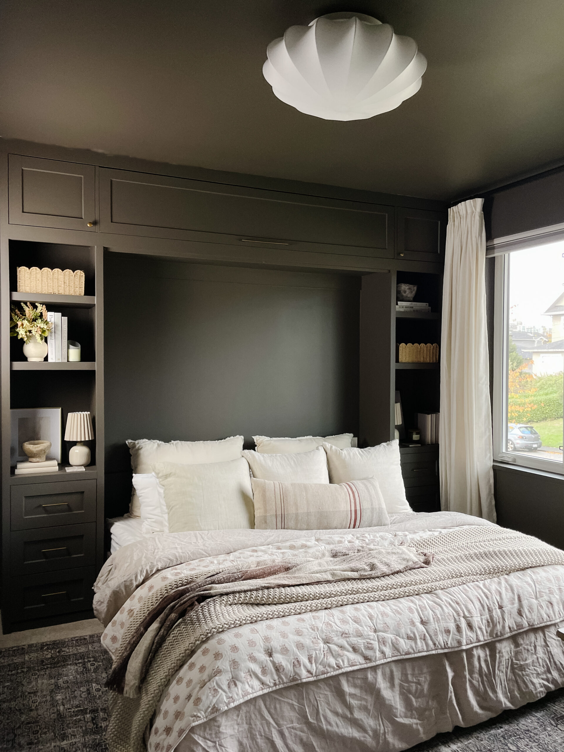 home office and guest room reveal - guestroom version with the murphy bed out and layers of bedding overtop for the ultimate cozy feel
