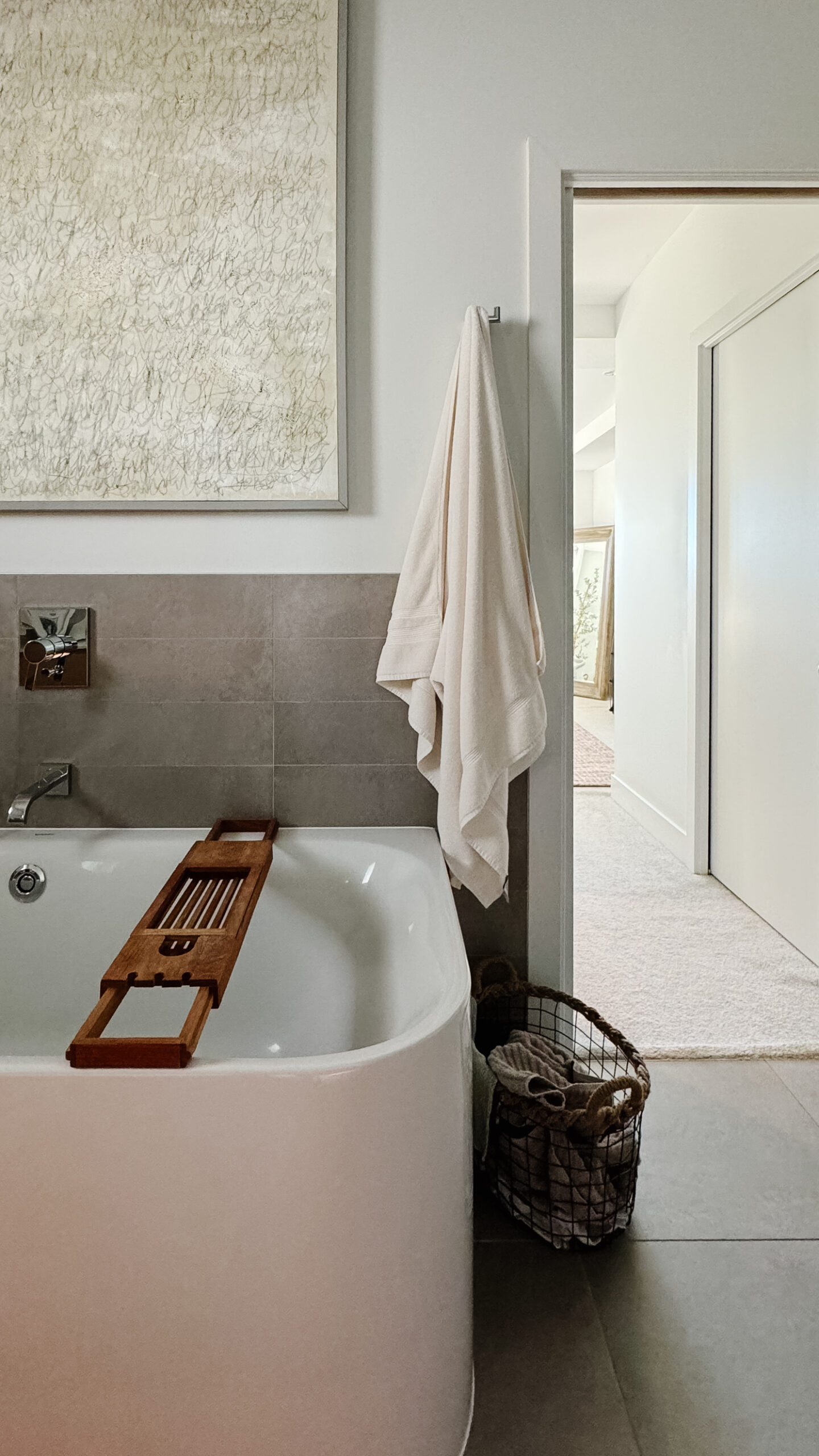 Luxury bathroom ideas. Super fluffy towel hanging by a tub