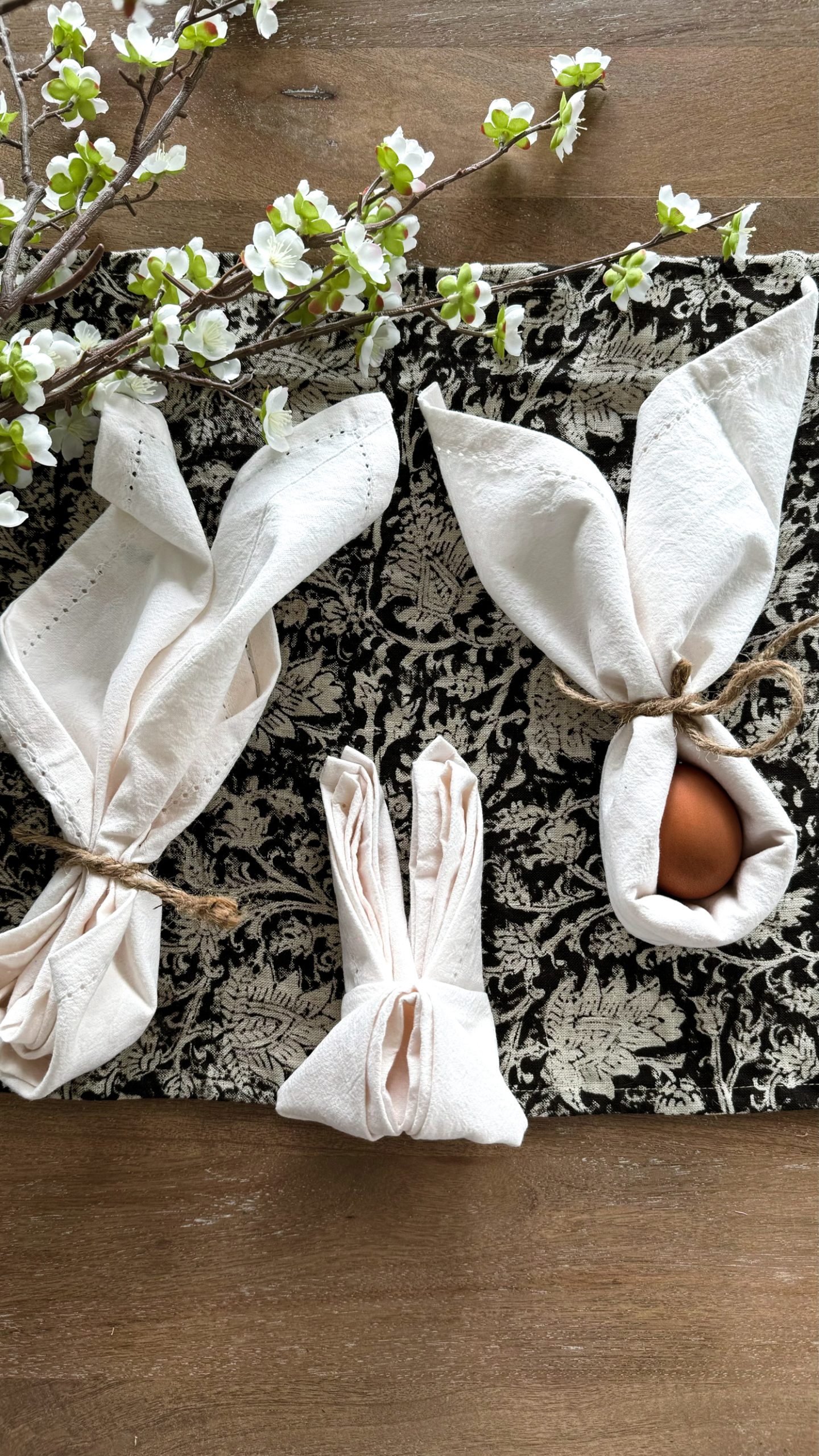 Three Easter Napkin folds on a table runner
